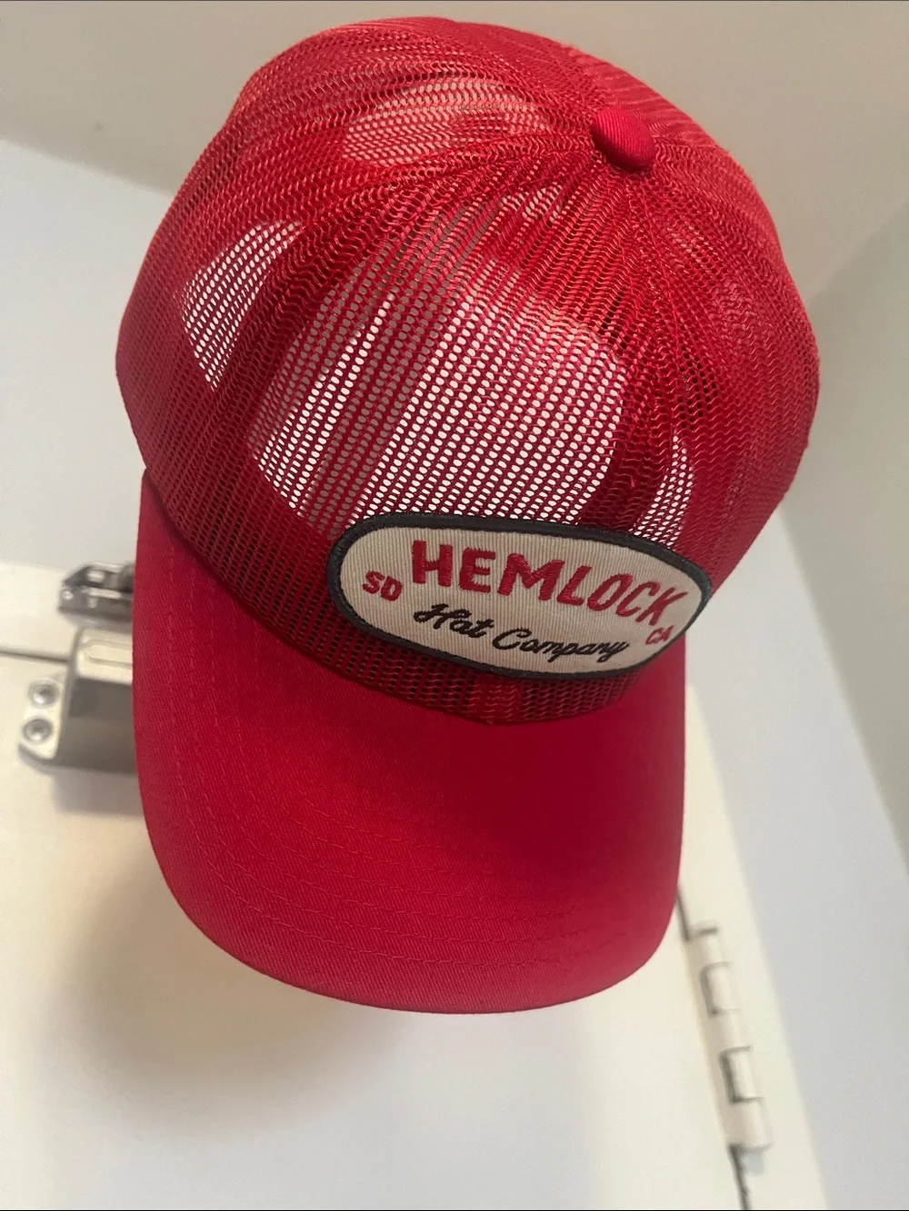 Hemlock Red Mesh Trucker Hat with Branded Patch